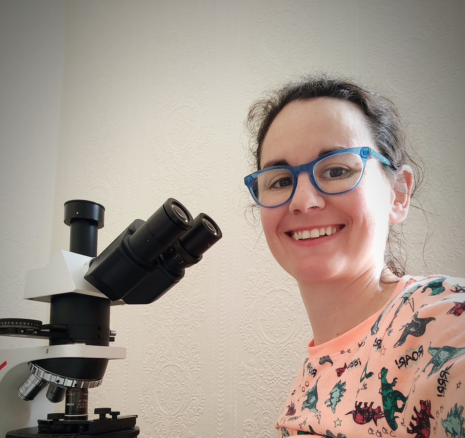Dr Mariem Saavedra from the University of Portmouth with a microscope