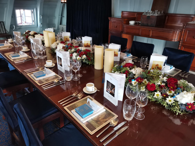 Table set up for Great Cabin Dinner onboard HMS Victory 