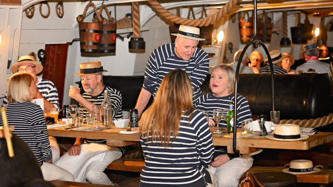 Group of people talking at a table