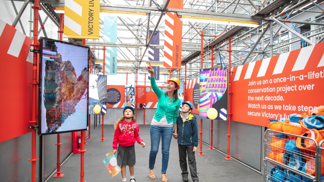 Family inside Victory Live entrance