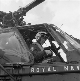 King Charles sitting in helicopter