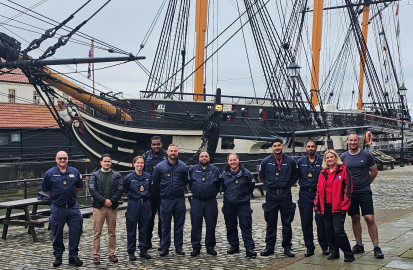 Members of the Royal Navy’s Race Diversity Network with Principal Curator Clare Hunt alongside HMS Trincomalee