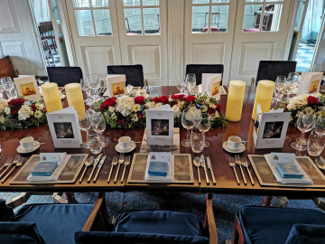 Dinner in the Great Cabin onboard HMS Victory. Credit NMRN