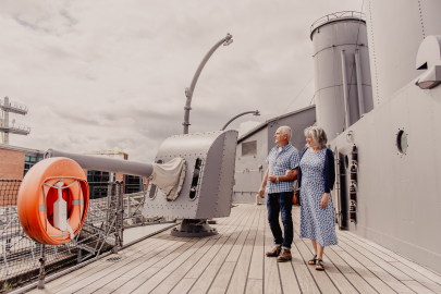 Couple on top deck of HMS Caroline