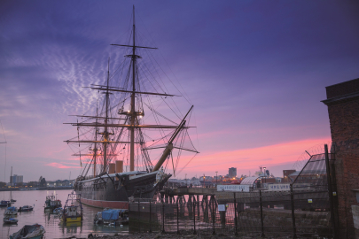 HMS Warrior 1860 at dusk at Portsmouth Historic Dockyard Credit C Stephens