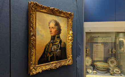 A gallery space featuring a 3/4 angle painting of Vice Admiral Lord Horatio Nelson