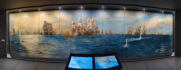 A panoramic photograph of a large naval battle painting