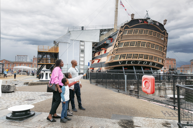 Family looking HMS Victory