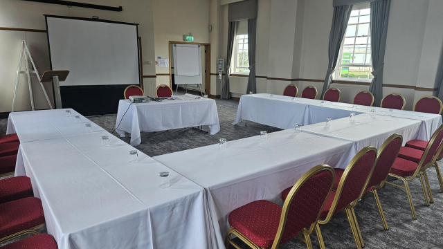 Hartlepool conference and meeting room hire space with tables and projector
