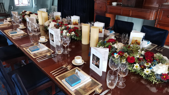 Table set up for Great Cabin Dinner onboard HMS Victory 