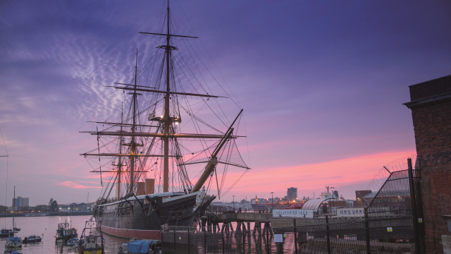 HMS Warrior 1860 at dusk at Portsmouth Historic Dockyard Credit C Stephens