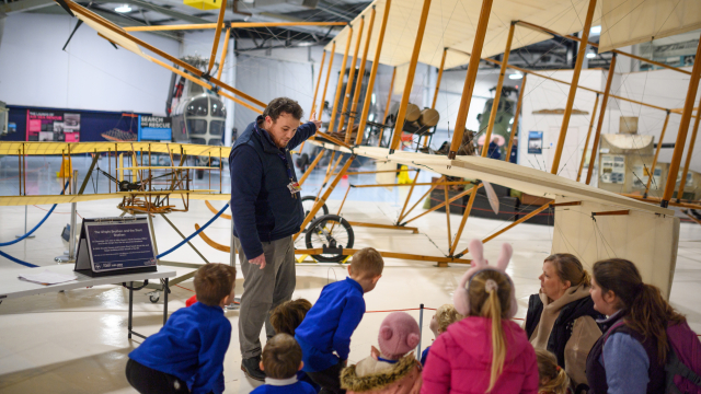 Team member showing aircraft