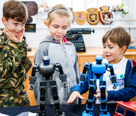 Children can control tiny robots in the fun activity. 