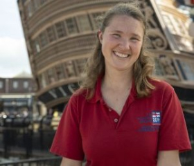 Dinnie Jay a Shipwright for the National Museum of the Royal Navy stood in front of HMS Victory