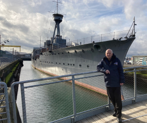 John Taylor alongside HMS Caroline