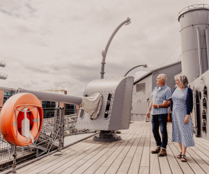 Couple on top deck of HMS Caroline