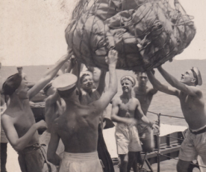 Eight men unloading 99 bags of mail at Colombo.