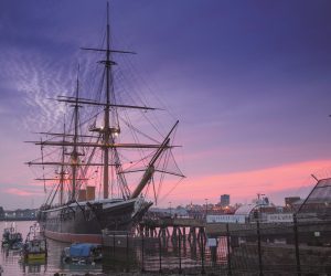 HMS Warrior 1860 at dusk at Portsmouth Historic Dockyard Credit C Stephens